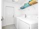 A clean, bright laundry room equipped with a washer and dryer at 2209 Crofton Ave, Davenport, FL 33837