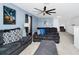 Cozy living room with comfortable seating and ample natural light, perfect for relaxation at 2209 Crofton Ave, Davenport, FL 33837