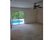 Bedroom with sliding glass doors to the pool, offering a tranquil indoor-outdoor living experience at 2817 Fitzooth Dr, Winter Park, FL 32792