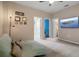 Spacious main bedroom featuring a ceiling fan and serene decor at 2936 Econ Landing Blvd, Orlando, FL 32825