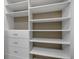 Custom closet with built-in shelving and drawers for optimal organization at 2936 Econ Landing Blvd, Orlando, FL 32825