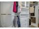Spacious walk-in closet with shelving, drawers, and ample hanging space for clothing at 2936 Econ Landing Blvd, Orlando, FL 32825