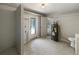 Utility room area showing washing machine hook ups, water heater, toilet, and backyard access at 300 Avenue E Se, Winter Haven, FL 33880