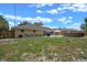 Backyard features a well-maintained lawn and patio with room for outdoor activities and entertaining at 3362 Partridge St, Deltona, FL 32738