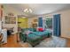 Cozy living room featuring plush seating, large windows, and a bright open floor plan, great for entertaining at 3362 Partridge St, Deltona, FL 32738