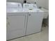 A laundry area featuring a new washer and dryer set, next to a utility sink at 3391 Orchid Dr, Indian Lake Estates, FL 33855