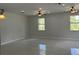Bright, open living room with tile flooring, recessed lighting and ceiling fans at 3391 Orchid Dr, Indian Lake Estates, FL 33855