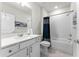 Clean bathroom featuring white subway tiles in the shower and a modern vanity with ample counter space at 4063 Roaming Brook Dr, Apopka, FL 32712