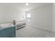 Serene bedroom with a crib and changing table, perfect as a Bedroom or cozy space for a  at 4063 Roaming Brook Dr, Apopka, FL 32712