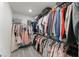 Spacious walk-in closet provides ample storage space for clothing and accessories at 4063 Roaming Brook Dr, Apopka, FL 32712
