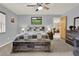 Comfortable bedroom featuring a bed with a quilt and neutral walls at 409 Jumper S Dr, Bushnell, FL 33513