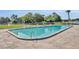 Inviting community pool with lounge chairs offers a relaxing and fun amenity for residents at 4306 Lake Underhill Rd # C, Orlando, FL 32803