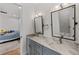 Modern bath with double vanity, and shared bath with another room at 5237 Haverill Dr, Orlando, FL 32809