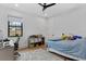 Cozy bedroom with desk, window view and comfortable accommodations at 5237 Haverill Dr, Orlando, FL 32809