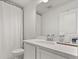 Bathroom featuring shower and large sink with white finishes at 5700 Iron Brand Rd, St Cloud, FL 34771