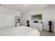 Bedroom with large flatscreen TV and carpet at 5700 Iron Brand Rd, St Cloud, FL 34771