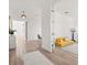 Spacious hallway with wood floors and modern light fixtures at 5700 Iron Brand Rd, St Cloud, FL 34771