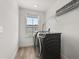 Laundry room featuring washer and dryer at 5700 Iron Brand Rd, St Cloud, FL 34771