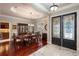 Elegant dining area featuring hardwood floors, a stylish chandelier, and an open layout at 5950 Blakeford Dr, Windermere, FL 34786
