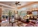 Open-concept living space connects seamlessly with outdoor patio through sliding doors, creating an inviting atmosphere at 5950 Blakeford Dr, Windermere, FL 34786