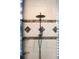 A gorgeous tile shower with a rain-style shower head and diamond-shaped accents at 5950 Blakeford Dr, Windermere, FL 34786