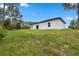 A home's spacious backyard offers room to roam at 6062 Sw 154Th Pl, Ocala, FL 34473