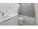 Bathroom features shower-tub combo and a clean white vanity at 6062 Sw 154Th Pl, Ocala, FL 34473