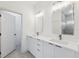 Contemporary bathroom has double vanity with bright neutral finish at 6062 Sw 154Th Pl, Ocala, FL 34473
