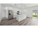 Stylish kitchen with stainless appliances and a large center island at 6062 Sw 154Th Pl, Ocala, FL 34473