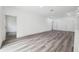 Bright and spacious room featuring laminate flooring at 6062 Sw 154Th Pl, Ocala, FL 34473