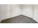 Neutral bedroom with carpet, white trim, and doors with view of closet and hall at 704 Pickfair Ter, Lake Mary, FL 32746