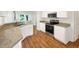 Well-equipped kitchen showcasing granite countertops, stainless steel appliances, and ample cabinet space at 704 Pickfair Ter, Lake Mary, FL 32746