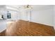 Spacious living room with hardwood floors, lots of light, and an open floor plan at 704 Pickfair Ter, Lake Mary, FL 32746
