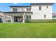 Backyard featuring a well-maintained lawn, providing a serene outdoor space at 808 Sherbourne Cir, Lake Mary, FL 32746