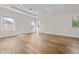 Spacious bedroom with tray ceiling, recessed lights and wood flooring at 808 Sherbourne Cir, Lake Mary, FL 32746