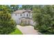 A home exterior from an aerial perspective, featuring lush trees at 808 Sherbourne Cir, Lake Mary, FL 32746
