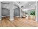 Open living space featuring wood floors and bright neutral color palette at 808 Sherbourne Cir, Lake Mary, FL 32746