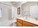 Bathroom with a tub-shower combo, a vanity with storage, and neutral wall colors at 927 Orange Cosmos Blvd, Davenport, FL 33837