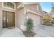 The house's front door and attached garage are visible in the home's exterior shot at 927 Orange Cosmos Blvd, Davenport, FL 33837