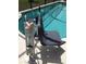 Pool lift for individuals with disabilities providing access to the pool at 927 Orange Cosmos Blvd, Davenport, FL 33837