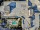 Aerial view showing the building's rooftop amenities, including a pool, lawn, and lounge areas at 100 S Eola Dr # 611, Orlando, FL 32801