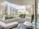Relax on this private balcony with comfortable seating and a view of the city at 100 S Eola Dr # 611, Orlando, FL 32801