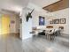 Dining area featuring custom bench seating, modern lighting, and unique decorative accents at 100 S Eola Dr # 611, Orlando, FL 32801