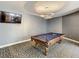 Fun game room featuring a pool table, flat-screen TV, and modern lighting at 100 S Eola Dr # 611, Orlando, FL 32801