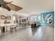 Spacious living area showcasing modern furnishings, an open floor plan, and unique architectural details at 100 S Eola Dr # 611, Orlando, FL 32801