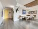 Stylish living space with modern dining area, built-in seating, and unique decor touches at 100 S Eola Dr # 611, Orlando, FL 32801