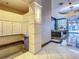 Elegant lobby area featuring a chandelier, mailboxes, seating, and a piano for residents and guests at 100 S Eola Dr # 611, Orlando, FL 32801