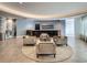 Comfortable seating area with modern décor, bar area, and tile floors for residents to relax and socialize at 100 S Eola Dr # 611, Orlando, FL 32801