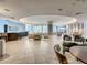 Spacious lounge area featuring comfortable seating, a bar area, and stylish lighting at 100 S Eola Dr # 611, Orlando, FL 32801