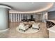 Inviting lounge space with comfortable seating, stylish décor, bar area, and tiled floors at 100 S Eola Dr # 611, Orlando, FL 32801